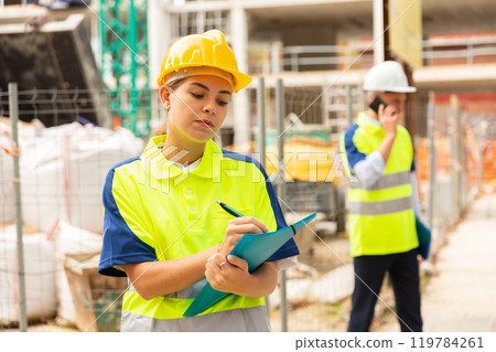 Girl engineer checking work process 119784261