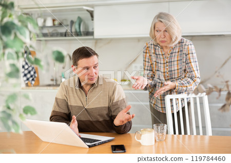 Family quarrel of mother and son Family quarrel of mother and son 119784460