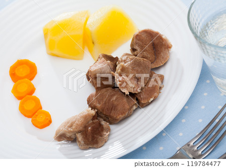 Cooked on steam turkey, served with potatoes and carrots, diet food 119784477