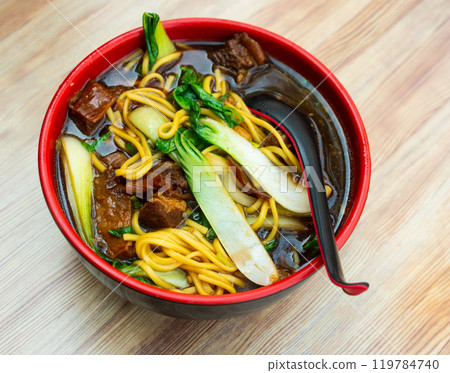 Bowl of ramen with wheat noodles, veal, mushrooms, chard Bowl of ramen with wheat noodles, veal, mushrooms, chard 119784740