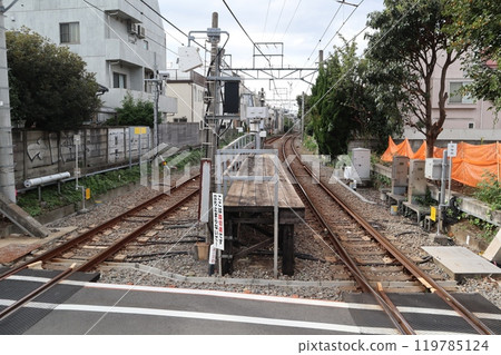 The Kuhonbutsu Station platform separated by a railroad crossing The Kuhonbutsu Station platform separated by a railroad crossing 119785124