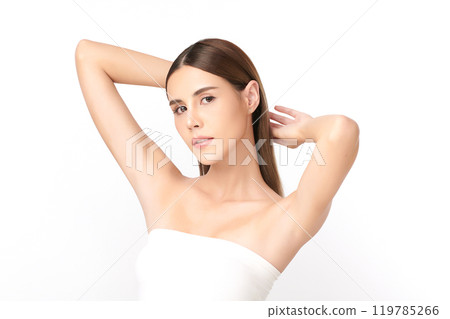 Beautiful Young Asian woman lifting hands up to show off clean and hygienic armpits or underarms on white background, Smooth armpit cleanliness and protection concept 119785266