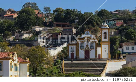 Colonial Church Facade Against a Hillside of Colorful Houses Colonial Church Facade Against a Hillside of Colorful Houses 119786251