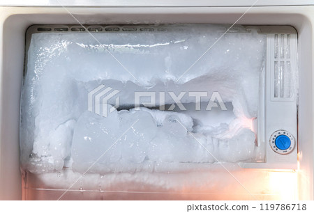 Inside a refrigerator's freezer compartment Excessive frost buildup in the freezer Inside a refrigerator's freezer compartment Excessive frost buildup in the freezer 119786718