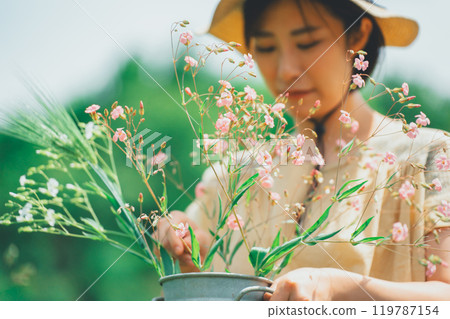 Picking flowers at a flower farm 119787154