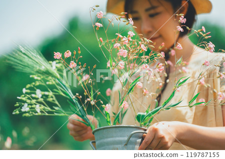 Picking flowers at a flower farm 119787155
