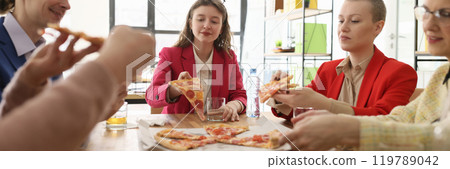 Colleagues enjoys fastfood at pizza party in company office 119789042