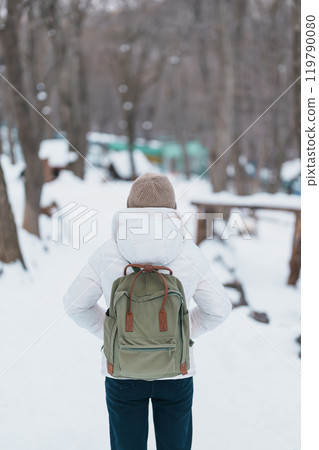 Woman tourist with snow in winter season at Zao fox village, traveler sightseeing Miyagi prefecture. landmark and popular for attraction near Sendai, Tohoku, Japan. Travel and Vacation 119790080