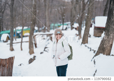 Woman tourist with Cute fox on snow in winter season at Zao fox village, traveler sightseeing Miyagi prefecture. landmark and popular for attraction near Sendai, Tohoku, Japan. Travel and Vacation Woman tourist with Cute fox on snow in winter season at Zao fox village, traveler sightseeing Miyagi prefecture. landmark and popular for attraction near Sendai, Tohoku, Japan. Travel and Vacation 119790082