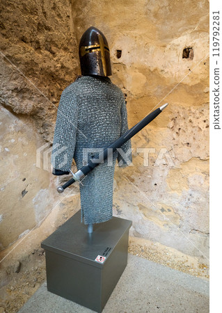 Chain mail, helmet and sword. Chain mail, helmet and sword. 119792281