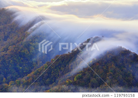 Autumn clouds over the waterfall at Shiori Pass 119793158