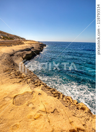 Tilt Rock Il Dwejra Bay, Gozo island Malta. Tilt Rock Il Dwejra Bay, Gozo island Malta. 119793534