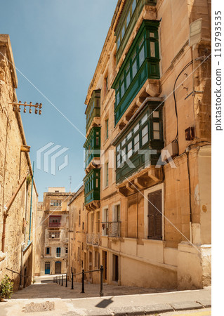 One of the small historic hidden streets in ancient city Valletta, Malta 119793535