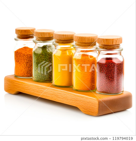 Assortment of Colorful Spices in Glass Jars 119794019