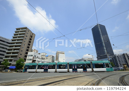 The first Green Mover crossing the intersection at Hiroshima Electric Railway's Matobacho tram stop The first Green Mover crossing the intersection at Hiroshima Electric Railway's Matobacho tram stop 119794224