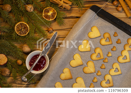 Christmas linzer cookies on the baking tray 119796309