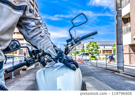Touring around Chofu Station on a large American motorcycle Touring around Chofu Station on a large American motorcycle 119796808