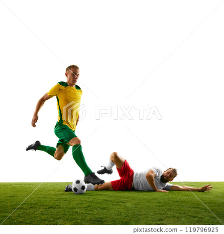 Two players facing off in intense moment of soccer game on green grass of football field, focusing on determination. Two players facing off in intense moment of soccer game on green grass of football field, focusing on determination. 119796925