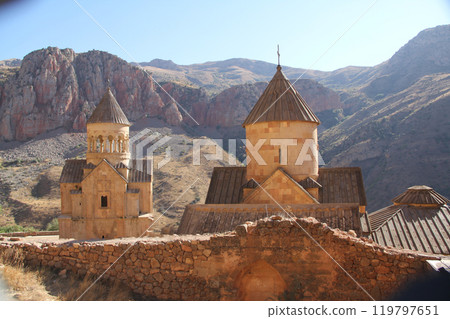 Ancient architecture of Tatev monastery in Armenia near mountains 119797651