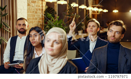 Multicultural people, colleagues meeting in seminar, engaged in learning and discussion. Corporate training session 119797971