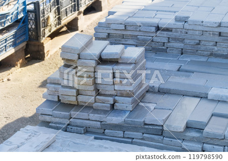 Quartzite decorative tiles are sold in construction market. Materials pile. Natural stone material for decoration and construction. Quartzite decorative tiles are sold in construction market. Materials pile. Natural stone material for decoration and construction. 119798590