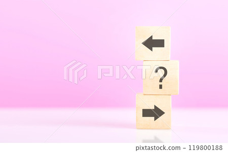 Forward and backward arrows on wooden blocks, symbolizing the concept of thought development. Reflects the process of reflecting on past actions while progressing toward future growth and improvement Forward and backward arrows on wooden blocks, symbolizing the concept of thought development. Reflects the process of reflecting on past actions while progressing toward future growth and improvement 119800188