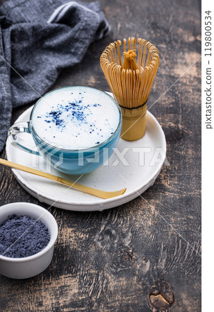 Matcha latte and tea whisk on wooden table Matcha latte and tea whisk on wooden table 119800534