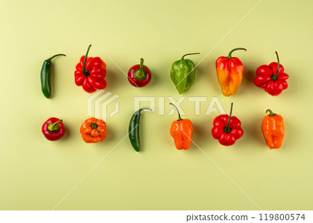 Vibrant pepper medley on pale background 119800574
