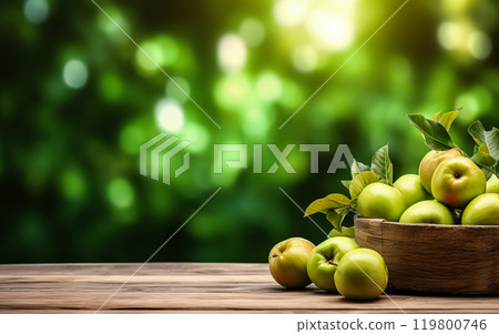 Fresh apples arranged on a rustic wooden table in a garden Fresh apples arranged on a rustic wooden table in a garden 119800746
