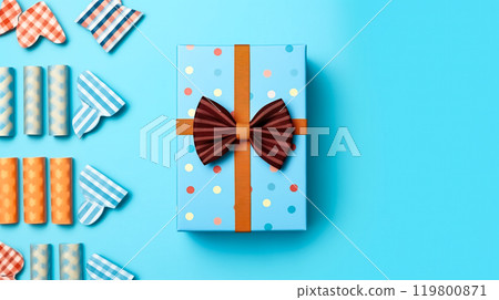 Celebrate Fathers Day in style with a gift box, necktie, and glasses elegantly arranged 119800871
