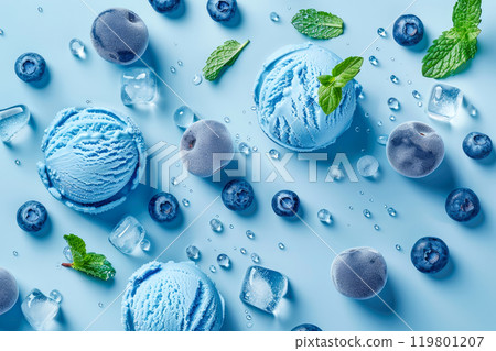 Blue ice cream scoops or balls with blueberries,mint leaves and ice cubes. Blue ice cream scoops or balls with blueberries,mint leaves and ice cubes. 119801207