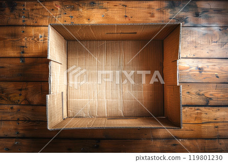 Flat lay of empty open cardboard box on old wooden floor. 119801230