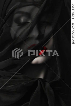 Female face obscured in the black soft fabric Female face obscured in the black soft fabric 119801454