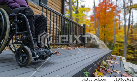A smooth, step-free outdoor deck allows wheelchair users to comfortably enjoy activities, fostering inclusivity. 119802631