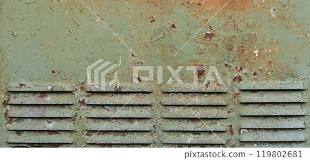 Rusty surface of louvre air vent. Detailed grungy texture of rusted steel ventilation grill. Weathered old panel with rust, chipped and peeling, aged iron, corrosion details, flaking fade green paint 119802681