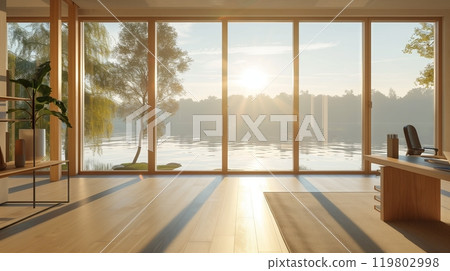 A minimalist home office with large sunlit windows overlooks a serene lake, boosting productivity and tranquility. 119802998