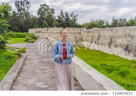 Female tourist exploring the Loreto Fort Museum in Puebla, Mexico. Cultural heritage, history, and travel exploration concept 119803631
