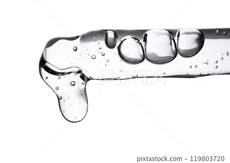 Dropper pipette with delicious serum with bubbles close-up. 119803720