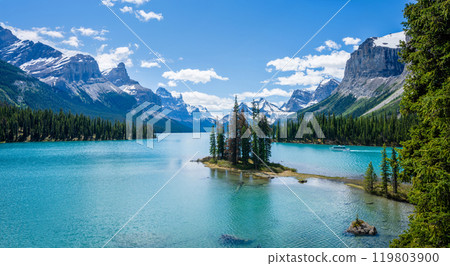 Spirit island in Maligne Lake. Snow-capped mountains and turquoise lakes scenery in Jasper National Park, Alberta, Canada. Canadian Rockies. Spirit island in Maligne Lake. Snow-capped mountains and turquoise lakes scenery in Jasper National Park, Alberta, Canada. Canadian Rockies. 119803900