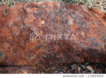 Detailed grungy texture of rusted metal plate. Rusty surface of brown and orange hues. Close-up of weathered old steel sheet with rust, chipped and peeling, aged iron, flaking paint, corrosion details Detailed grungy texture of rusted metal plate. Rusty surface of brown and orange hues. Close-up of weathered old steel sheet with rust, chipped and peeling, aged iron, flaking paint, corrosion details 119803956