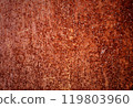Backdrop of rusty surface of dark, brown, and orange hues. Detailed grunge rusted metal texture. Close-up of rust patterns, aged iron, scratched, worn, distressed areas, decay, corrosion details 119803960