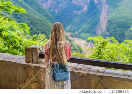 Female tourist exploring Sumidero Canyon National Park, Mexico. Adventure, natural exploration, and travel experience concept Female tourist exploring Sumidero Canyon National Park, Mexico. Adventure, natural exploration, and travel experience concept 119806885