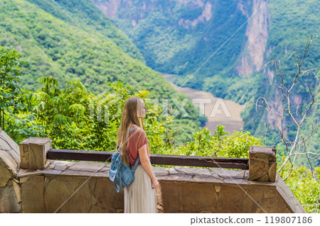 Female tourist exploring Sumidero Canyon National Park, Mexico. Adventure, natural exploration, and travel experience concept 119807186
