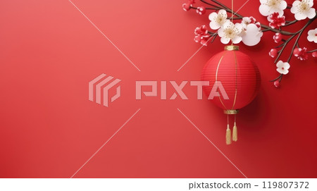 Red paper lantern hanging from a branch with white paper flowers on a red background. Chinese New Year 119807372