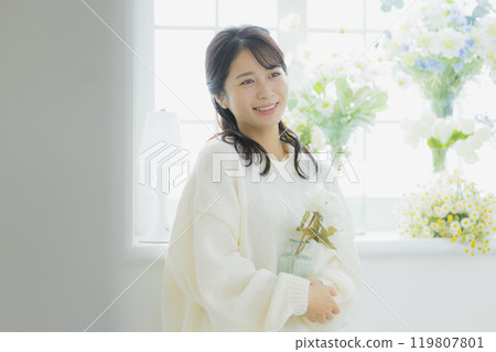Woman in white knit 119807801