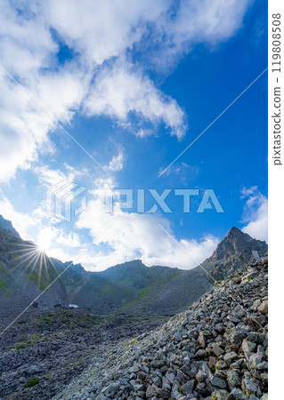 [Mountain material] Mt. Yari and blue sky at sunset as seen from Yarisawa Cirque [Nagano Prefecture] 119808508