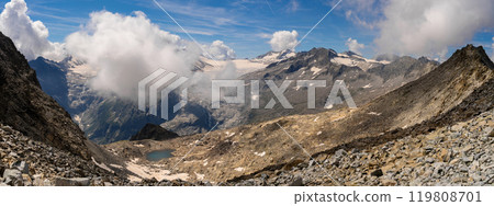 Majestic Mountain Range with Glaciers and Clouds Majestic Mountain Range with Glaciers and Clouds 119808701
