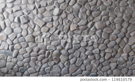 A wall of cobblestones of a different color A wall of cobblestones of a different color 119810579