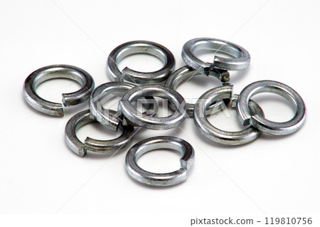 Large split spring washers on white background 119810756