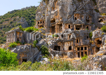 Ruins of ancient Lycian necropolis with rock-cut tombs in Demre 119811305
